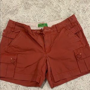 Low-waisted, rust colored shorts